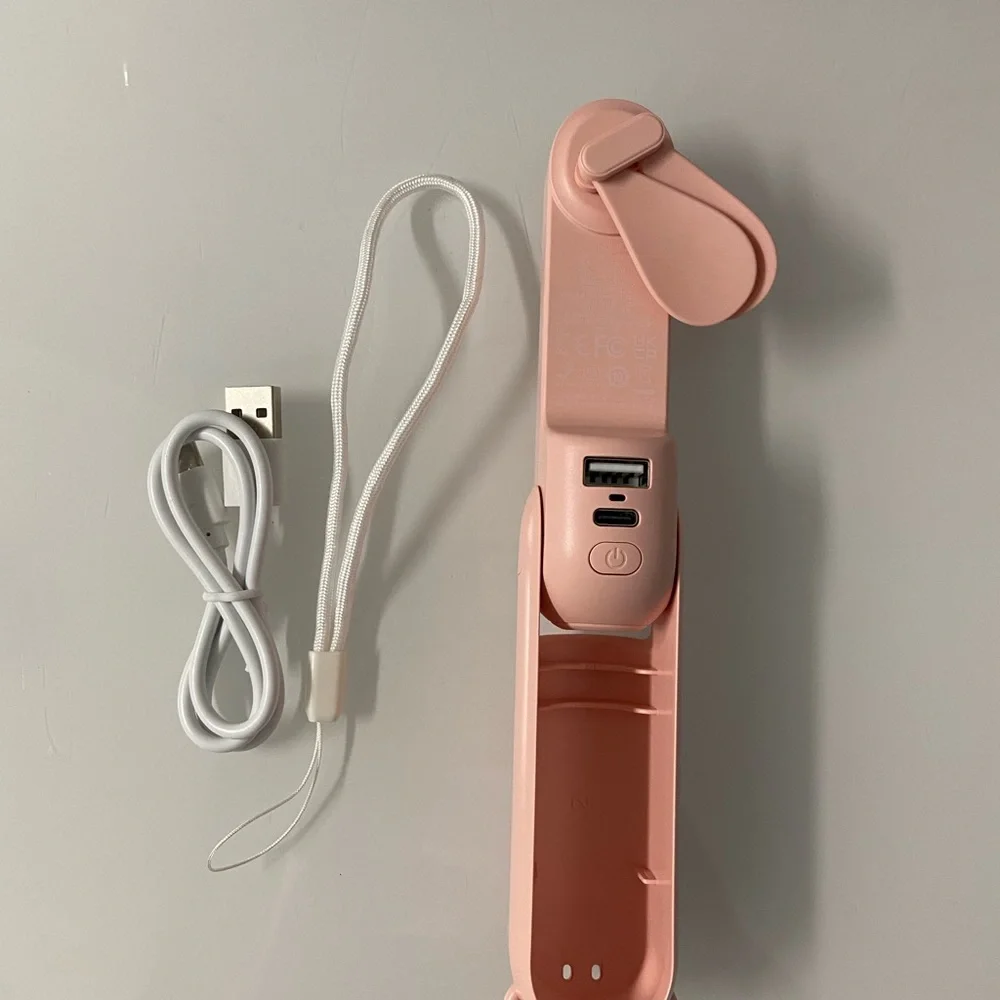JISULIFE mini handheld fan. 3 in 1, flashlight, power bank, rechargeable fan